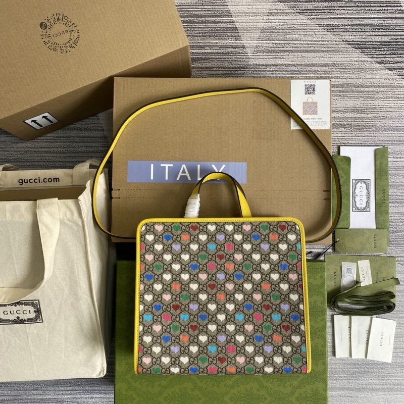 G*u*i shopping bags